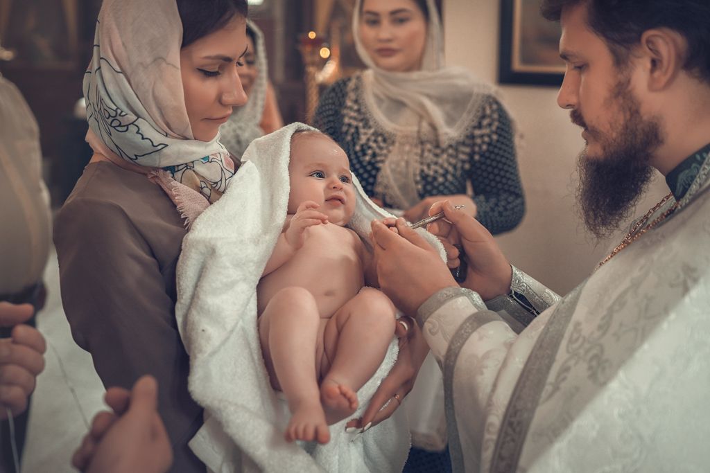 Таинство крещения в храме Иоанна Кронштадского
