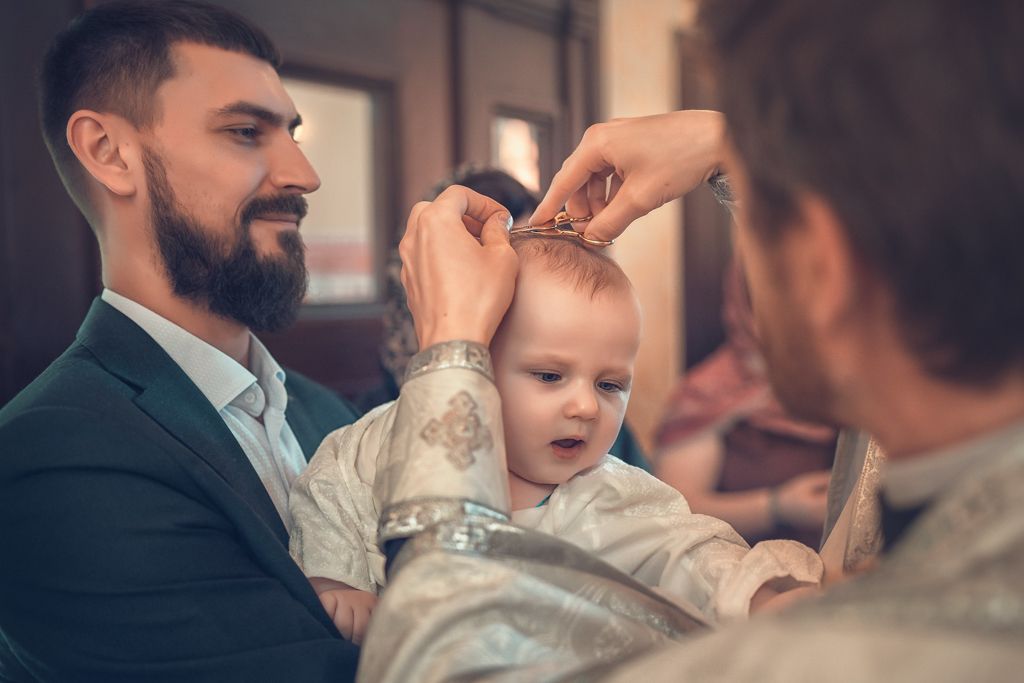 Таинство крещения в храме-колокольне в Токсово